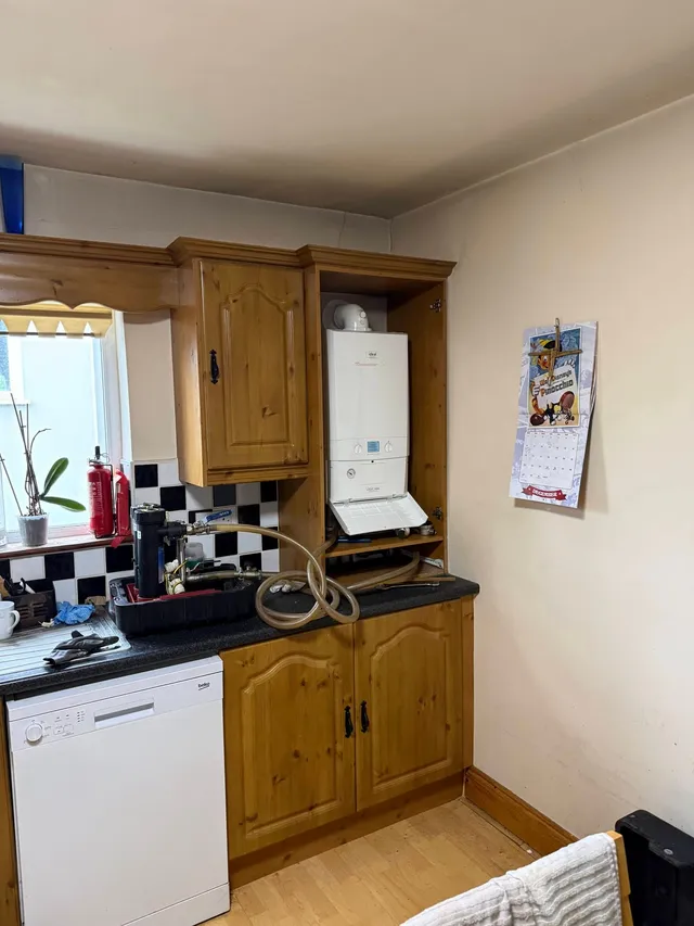 A gas boiler on the wall of a kitchen in a house near Charleville